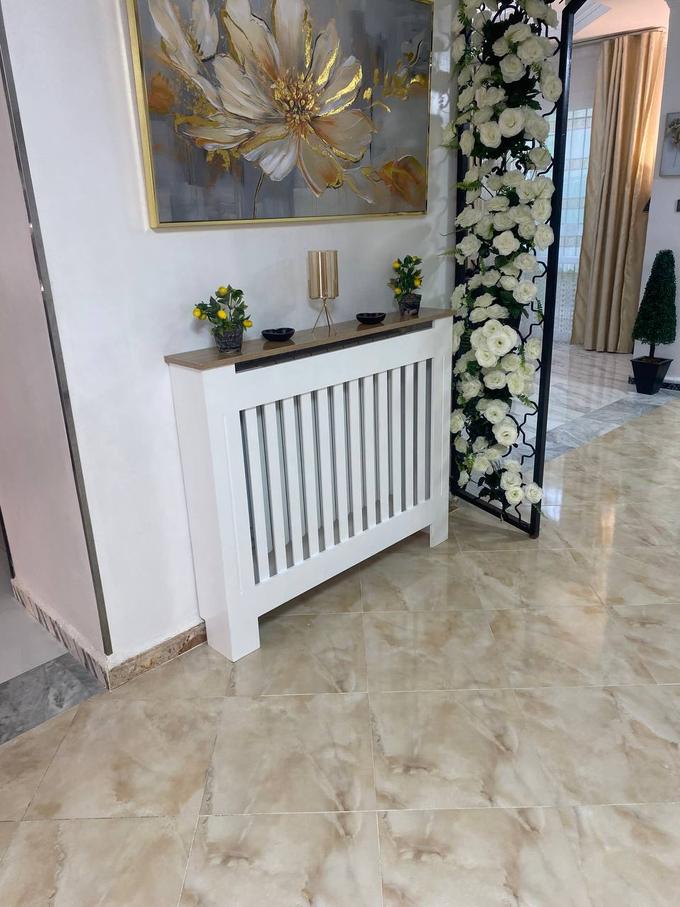 غطاء مدفأة عصري وجميل